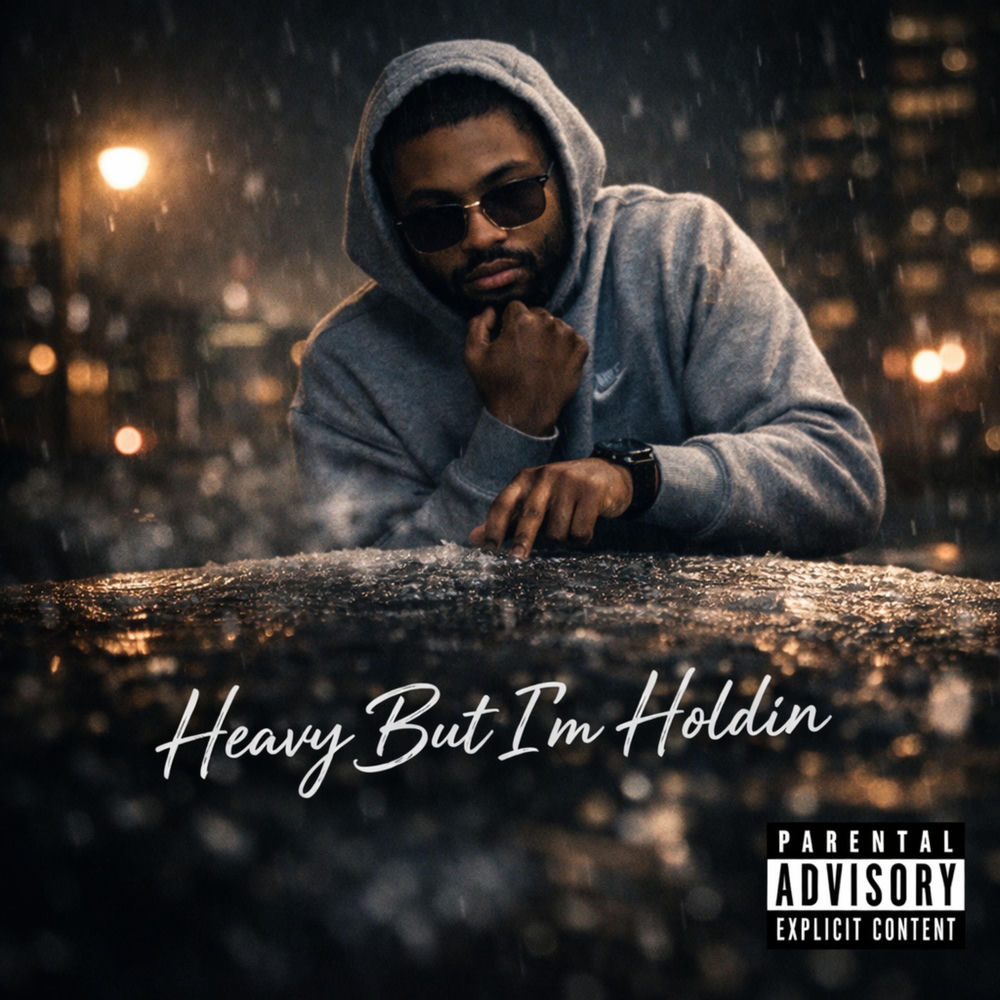 Okładka: Heavy But I’m Holdin